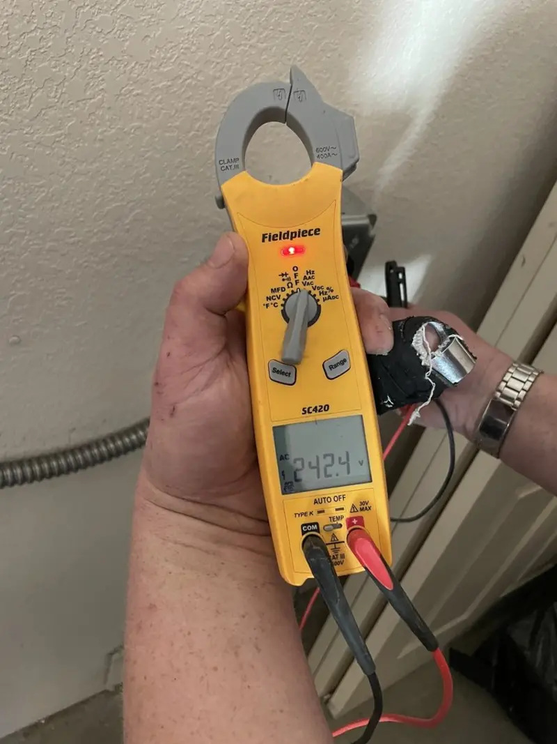 Voltage testing with clamp meter during Circuit Breaker Repair in Center Point